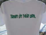 Weedy TC design with Dark Green Ink on a  White Men's Gildan Softstyle Pre-Shrunk 100% Cotton Tee**ONLY 10 T-SHIRTS PRINTED FOR THIS BRAND/COLOR!!**